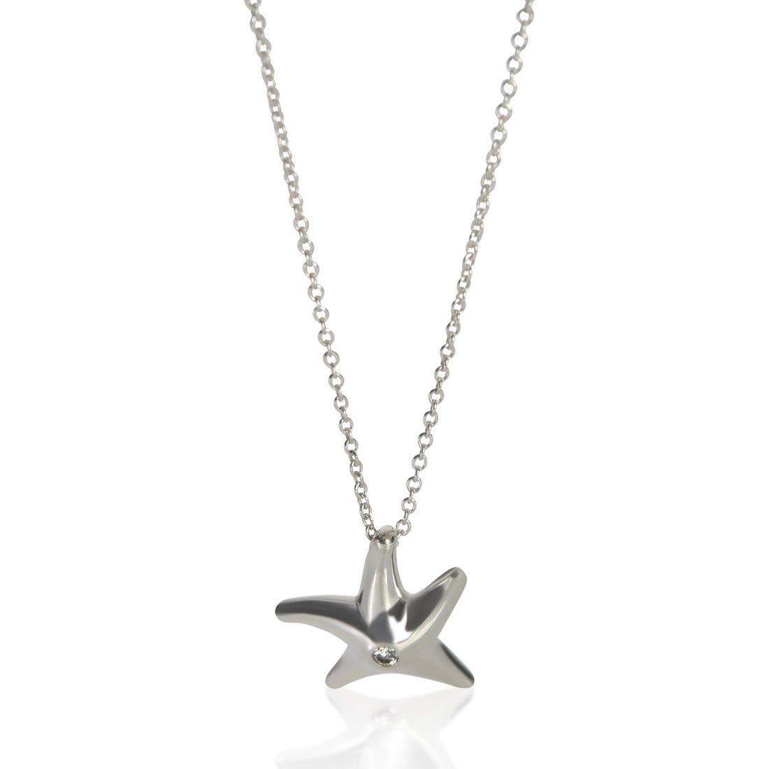 Elsa Peretti Starfish Pendant in Sterling Silver with Diamond by Tiffany: Elsa Peretti Starfish Pendant in Sterling Silver with Diamond by Tiffany This Tiffany & Co. Elsa Peretti Starfish pendant features a round brilliant diamond set in sterling silver. The necklace measur