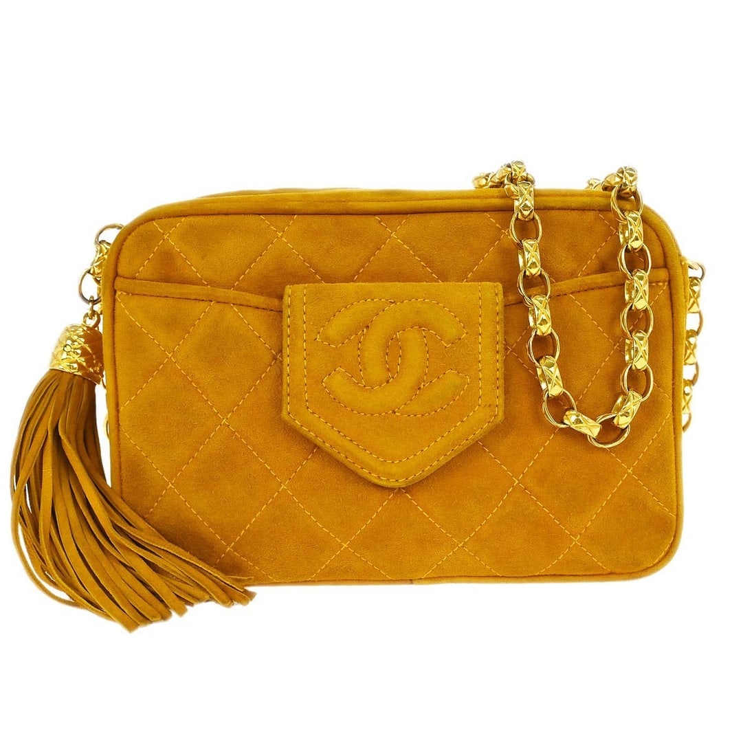 Mini Yellow Suede Shoulder Bag by Chanel with Camera Bag Design: Mini Yellow Suede Shoulder Bag by Chanel with Camera Bag Design This Chanel mini camera bag features a vibrant yellow suede exterior and a shoulder strap for easy carrying. Crafted in Italy, it offers