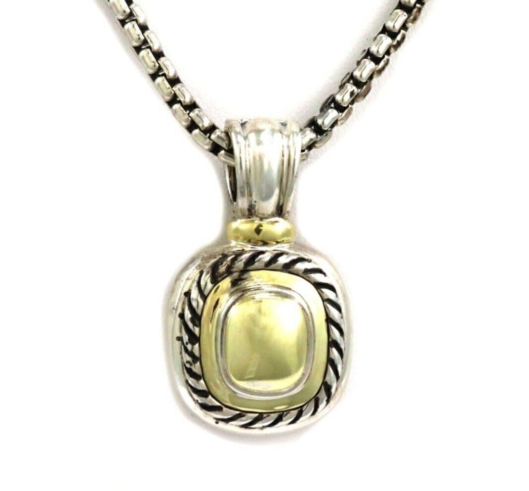 Albion Pendant Necklace in Sterling Silver and 14k Gold by David Yurman: Albion Pendant Necklace in Sterling Silver and 14k Gold by David Yurman This vintage David Yurman Albion pendant necklace features a unique design crafted from sterling silver and 14k yellow gold. The