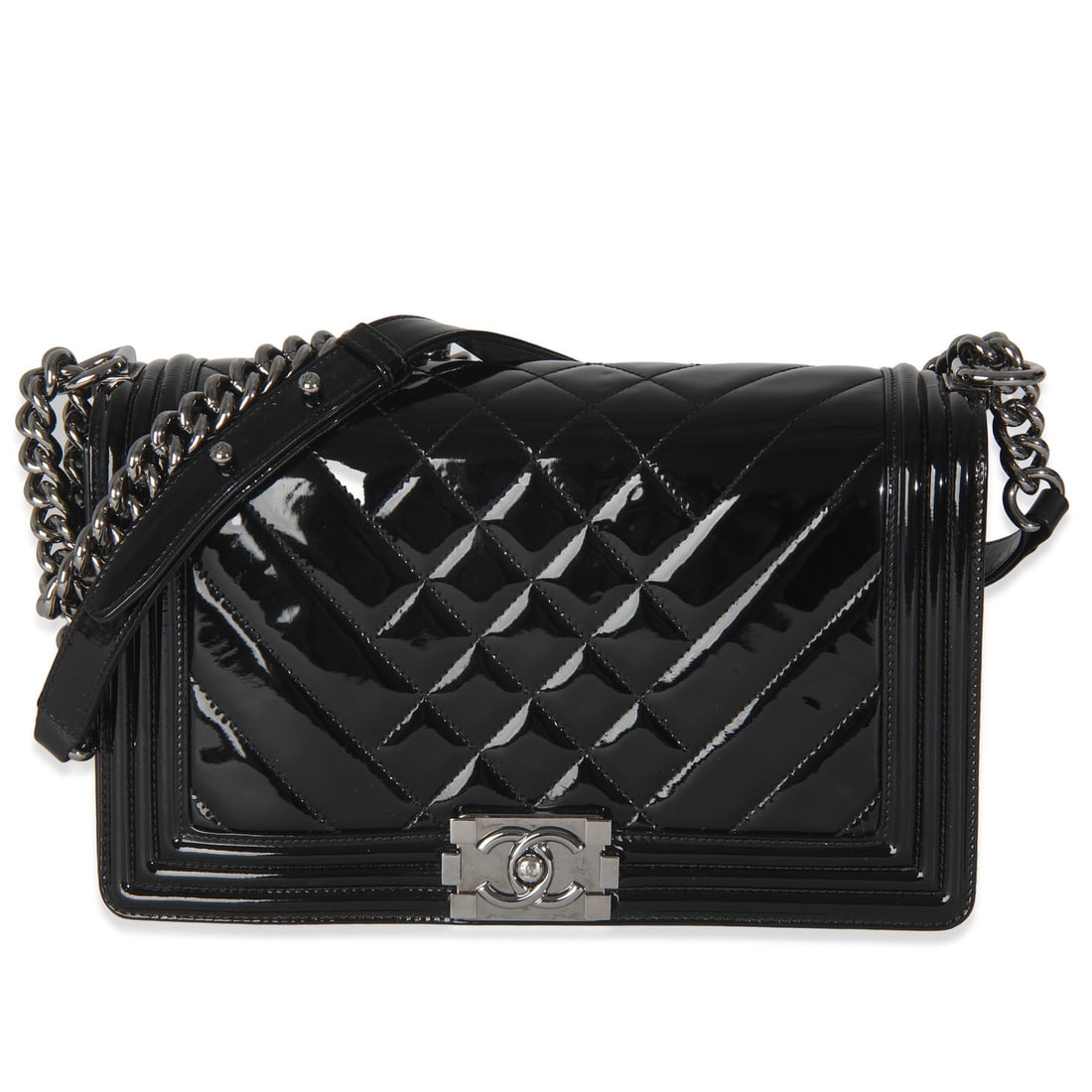 Chanel Old Medium Boy Bag Black Patent Chevron Shoulder Purse: Chanel Old Medium Boy Bag Black Patent Chevron Shoulder Purse This Chanel Old Medium Boy Bag features a sleek black patent leather exterior with a chevron pattern. Designed for unisex use, it has a st