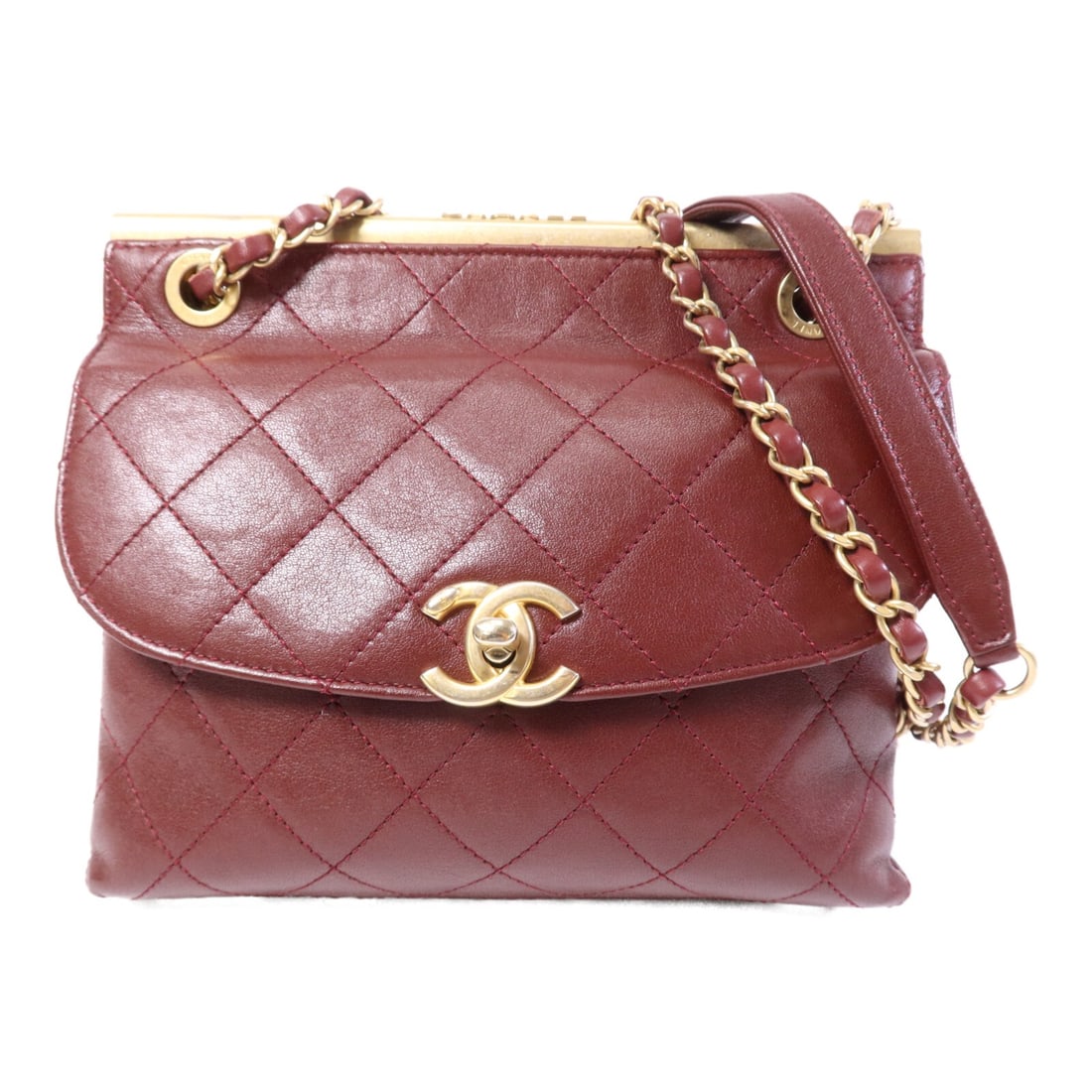 Chanel Black and Red Calfskin CC Shoulder Bag with Gold Hardware: Chanel Black and Red Calfskin CC Shoulder Bag with Gold Hardware This CHANEL CC chain shoulder bag is crafted from black calfskin leather with gold-tone hardware accents. The bag features a compact de