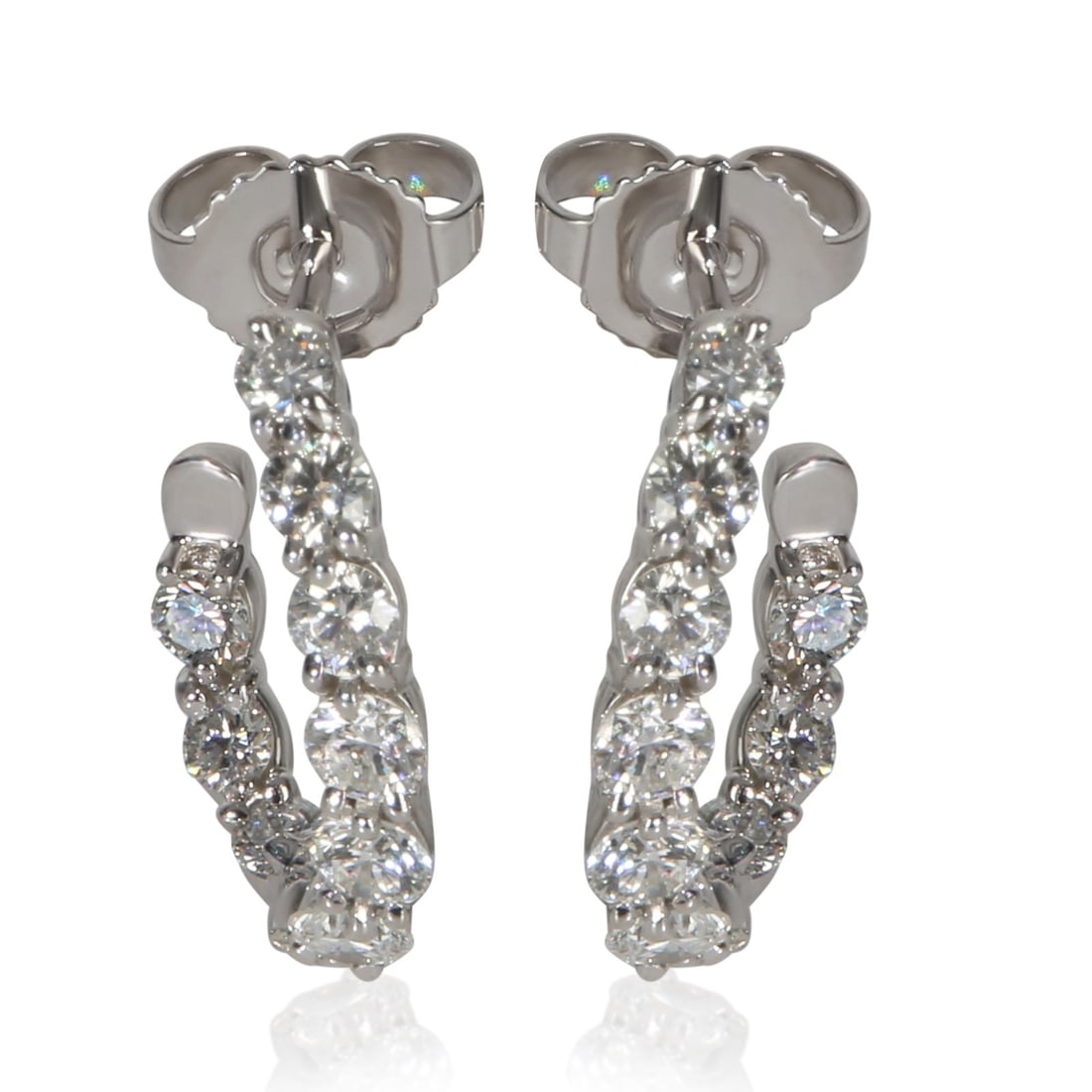 Inside-Out Hoop Earrings in Platinum with Diamonds by Tiffany & Co.: Inside-Out Hoop Earrings in Platinum with Diamonds by Tiffany & Co. These Tiffany & Co. Inside-Out Hoop Earrings are crafted in platinum and feature round brilliant diamonds with a total carat weight 
