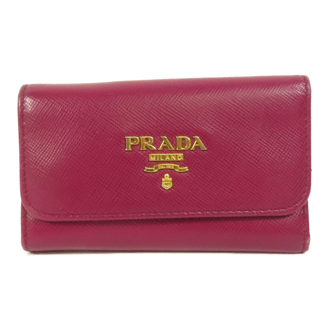 Purple Calfskin Leather Key Ring by Prada: Purple Calfskin Leather Key Ring by Prada This Prada key holder is crafted from purple calfskin leather, offering a stylish and functional accessory for organizing keys. Made in Italy, it features a r