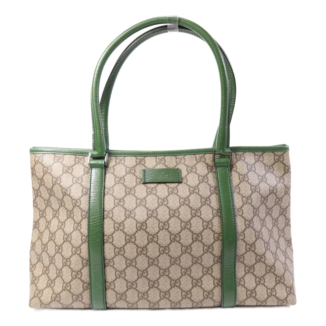 Gucci GG Brown Green Coated Canvas Tote Bag with Silver Hardware: Gucci GG Brown Green Coated Canvas Tote Bag with Silver Hardware This Gucci GG tote bag features a brown and green design crafted from PVC coated canvas. The bag is designed for women and offers a spa