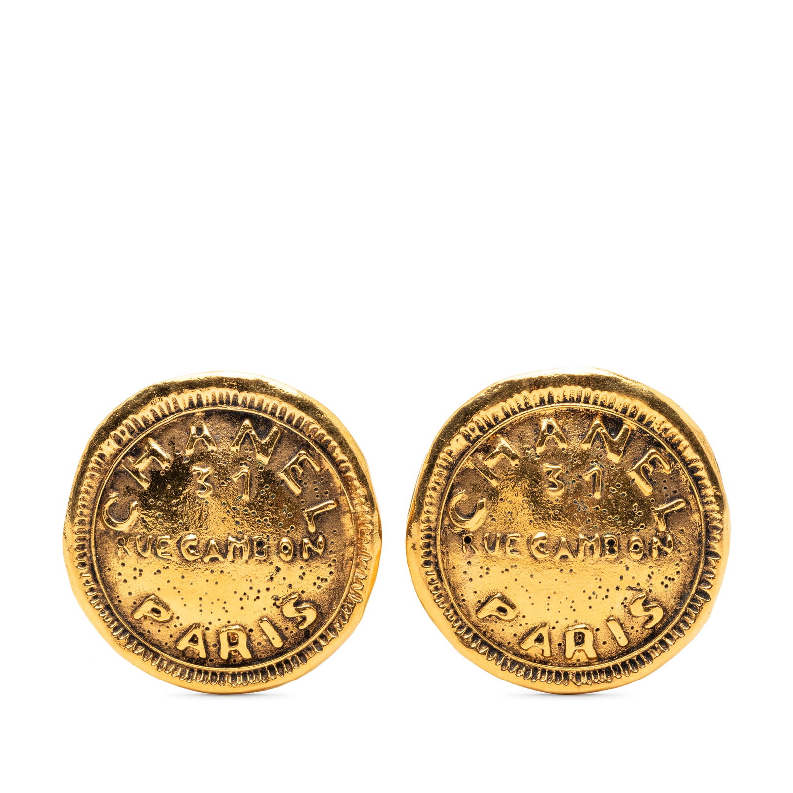 Chanel 31 Rue Cambon Gold Tone Round Clip Earrings: Chanel 31 Rue Cambon Gold Tone Round Clip Earrings These Chanel 31 Rue Cambon round clip-on earrings feature a gold-plated metal body and clip-on closures. They are designed in a classic round shape a
