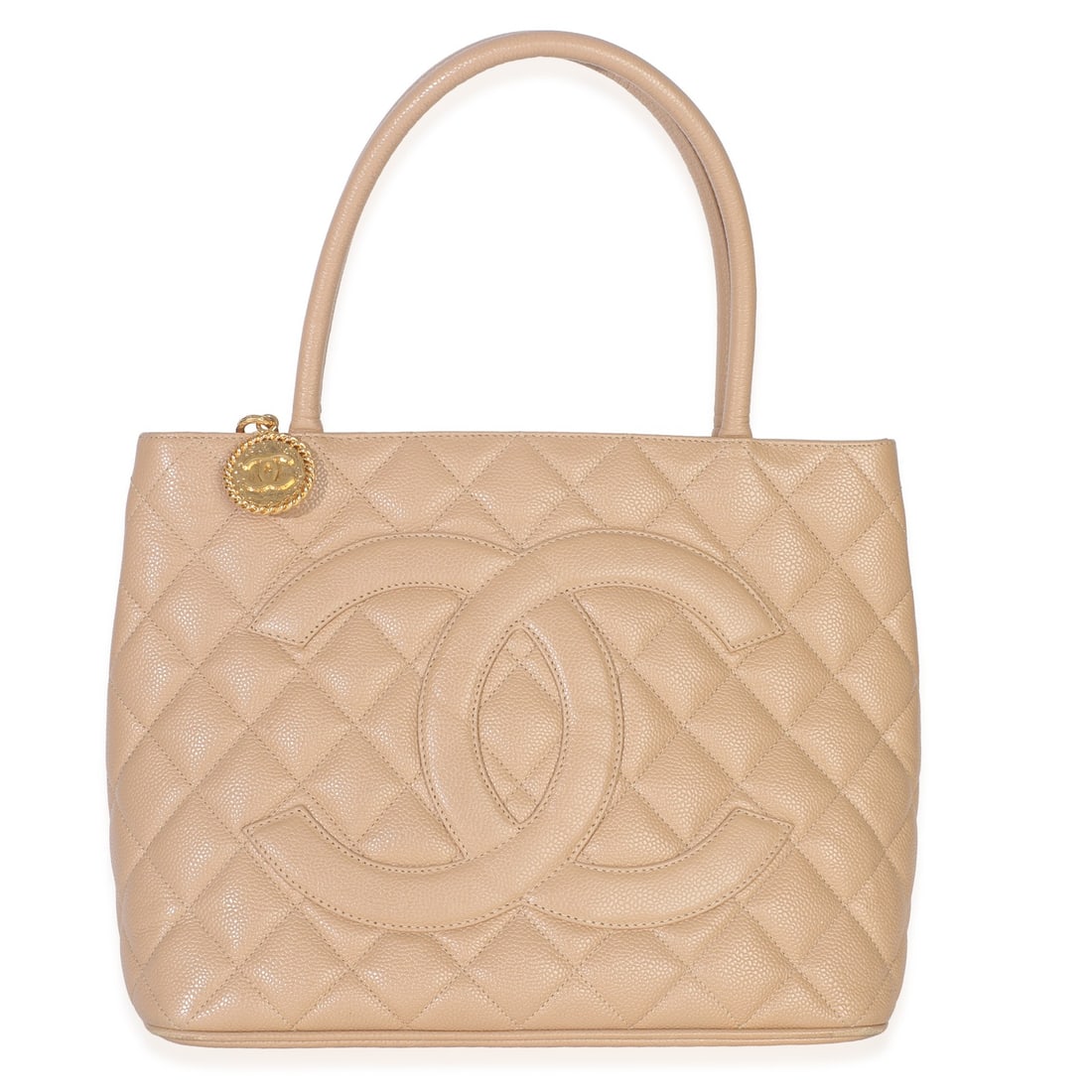 Beige Caviar Leather Medallion Tote Bag by Chanel: Beige Caviar Leather Medallion Tote Bag by Chanel This Chanel Medallion Tote features a beige quilted caviar leather exterior and a zip-top closure. The bag is designed with gold-tone hardware and has