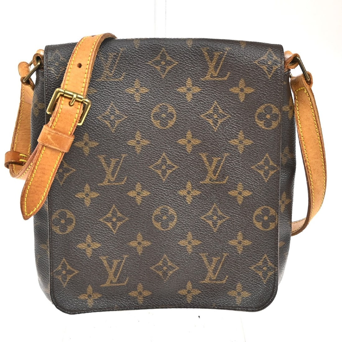 Louis Vuitton Musette Canvas Brown Shoulder Bag: Louis Vuitton Musette Canvas Brown Shoulder Bag Louis Vuitton Musette handbag crafted from brown monogram canvas designed for women. The bag shows signs of wear including scuffs, dirt, stains, wrinkle
