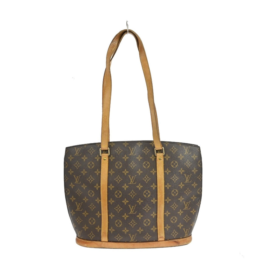 Louis Vuitton Babylone Monogram Canvas Large Tote Bag M51102: Louis Vuitton Babylone Monogram Canvas Large Tote Bag M51102 This Louis Vuitton Babylone hand tote bag features the iconic monogram canvas leather exterior in brown, complemented by beige double leath