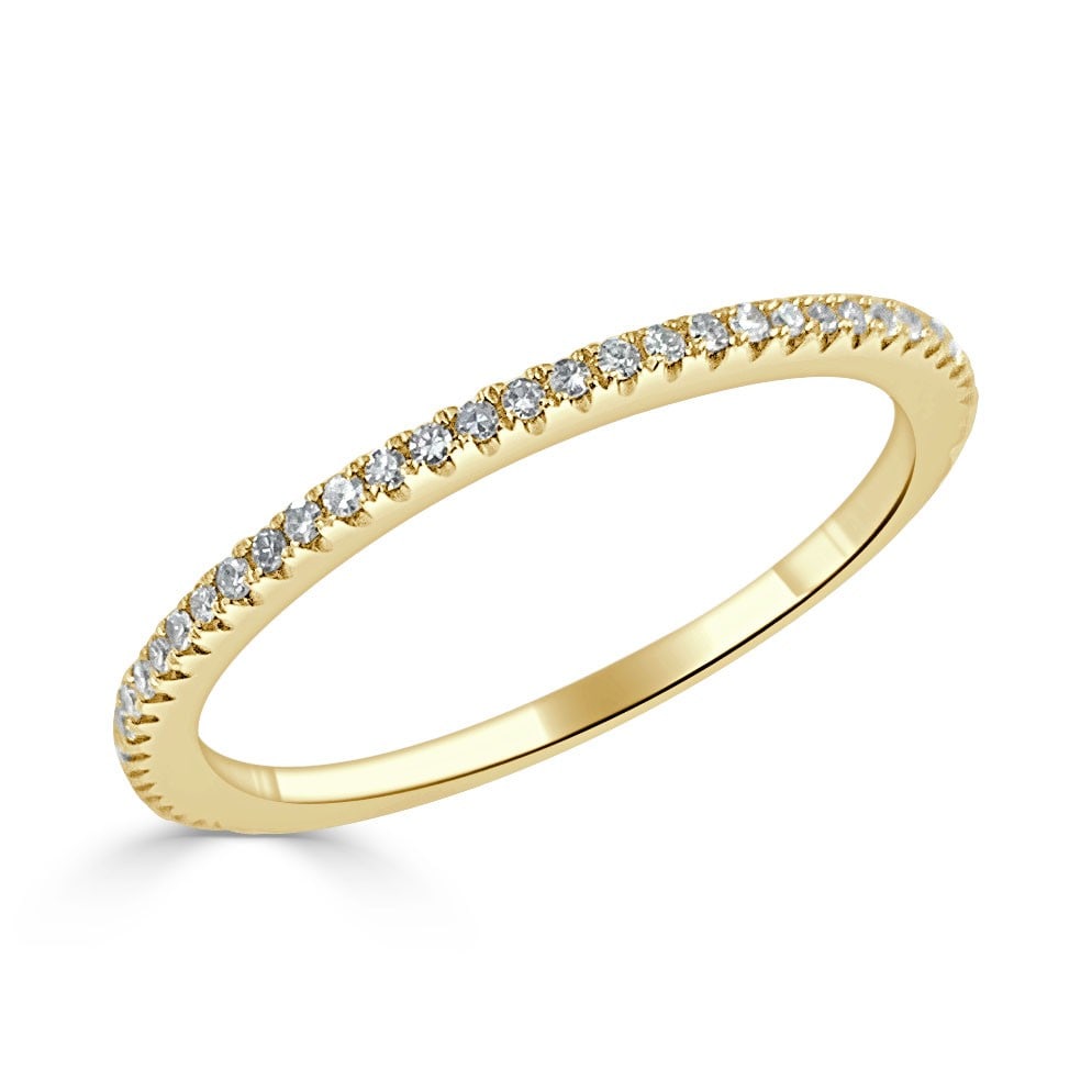 Women's 14KT Yellow Gold Diamond Eternity Band Size 6.5: Women's 14KT Yellow Gold Diamond Eternity Band Size 6.5 This women's eternity band features 61 round white diamonds set in 14K yellow gold. The total diamond weight is 0.16 carats with a clarity grade
