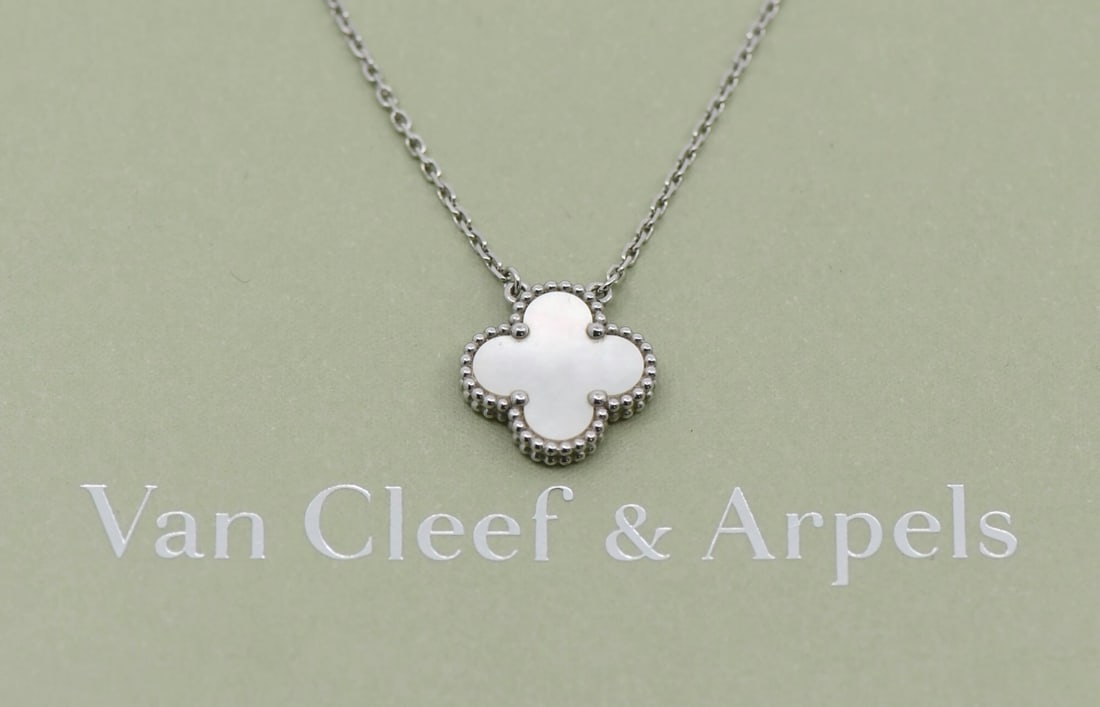Van Cleef Arpels Vintage Alhambra Necklace 18K White Gold Mother of Pearl 16 Inch: Van Cleef Arpels Vintage Alhambra Necklace 18K White Gold Mother of Pearl 16 Inch This Van Cleef & Arpels Vintage Alhambra necklace features a pendant crafted in 18k white gold and adorned with mother