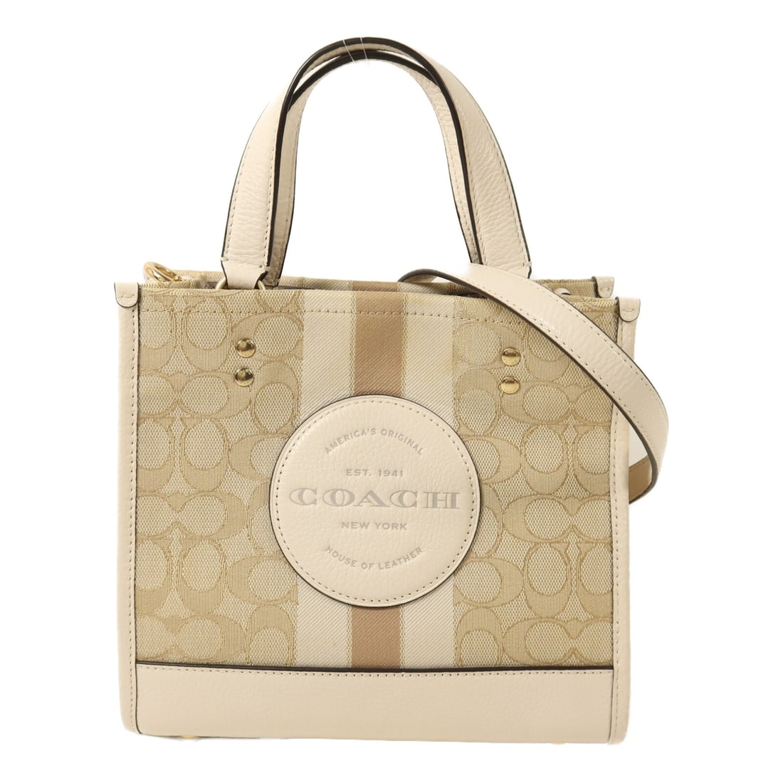 Coach White Canvas and Calfskin 2-Way Shoulder Bag with Gold Hardware: Coach White Canvas and Calfskin 2-Way Shoulder Bag with Gold Hardware This COACH 2-way shoulder bag features a stylish combination of canvas and calfskin leather in white and beige tones. Designed for