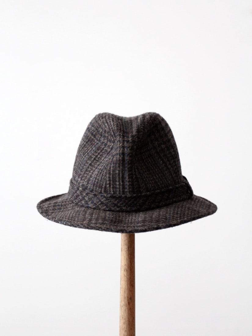 1960s Vintage Stetson Charcoal Gray Wool Fedora Hat: 1960s Vintage Stetson Charcoal Gray Wool Fedora Hat Discover a classic piece of history with this Vintage Stetson Plaid Wool Fedora from the 1960s. This stylish charcoal gray wool hat showcases a char