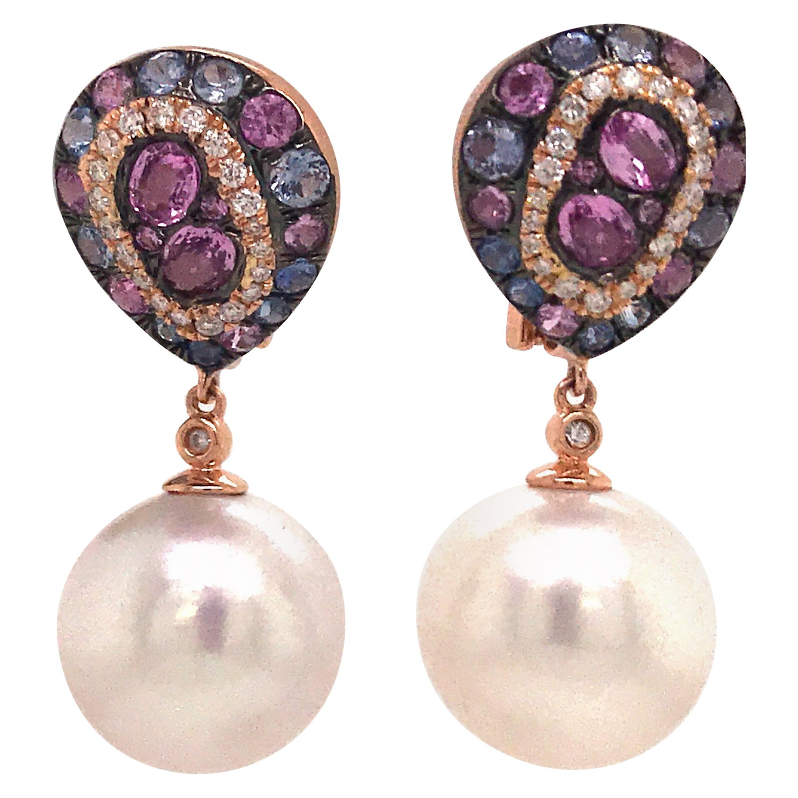 Harbor Diamonds 18K Rose Gold Sapphire Diamond Drop Earrings 2.69 Carat: Harbor Diamonds 18K Rose Gold Sapphire Diamond Drop Earrings 2.69 Carat Exquisite 18K Rose Gold drop earrings featuring a stunning combination of blue sapphires and pink sapphires. The earrings showca