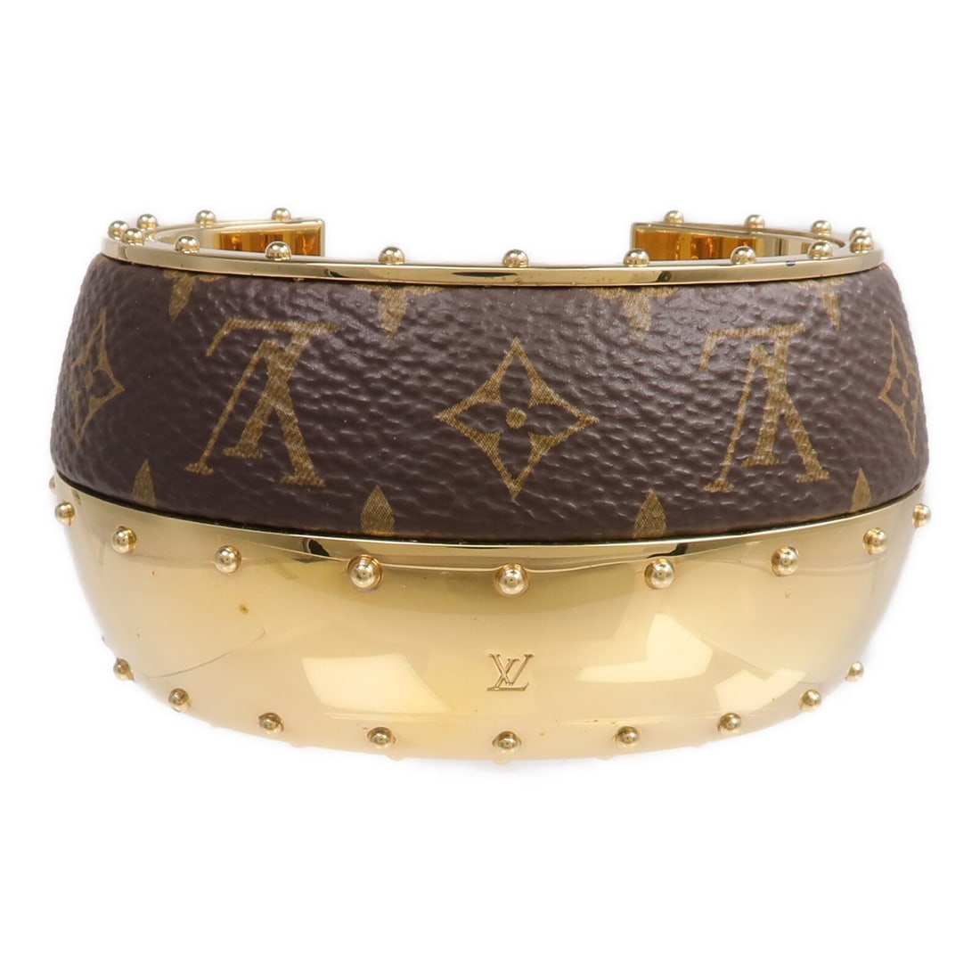 Monogram Brown Gold PVC Canvas Bracelet by Louis Vuitton M64679: Monogram Brown Gold PVC Canvas Bracelet by Louis Vuitton M64679 This Louis Vuitton bracelet features a brown PVC coated canvas with the iconic Monogram design. Designed for women, it showcases a sleek