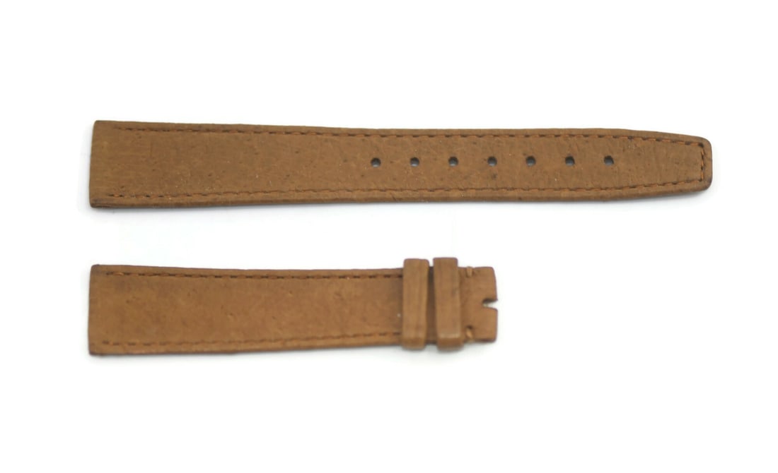 Authentic Movado Brown Leather Wristwatch Band 17mm: Authentic Movado Brown Leather Wristwatch Band 17mm This Movado wristwatch band is crafted from high-quality brown leather, offering both style and durability. With a band width of 17 mm, it is design
