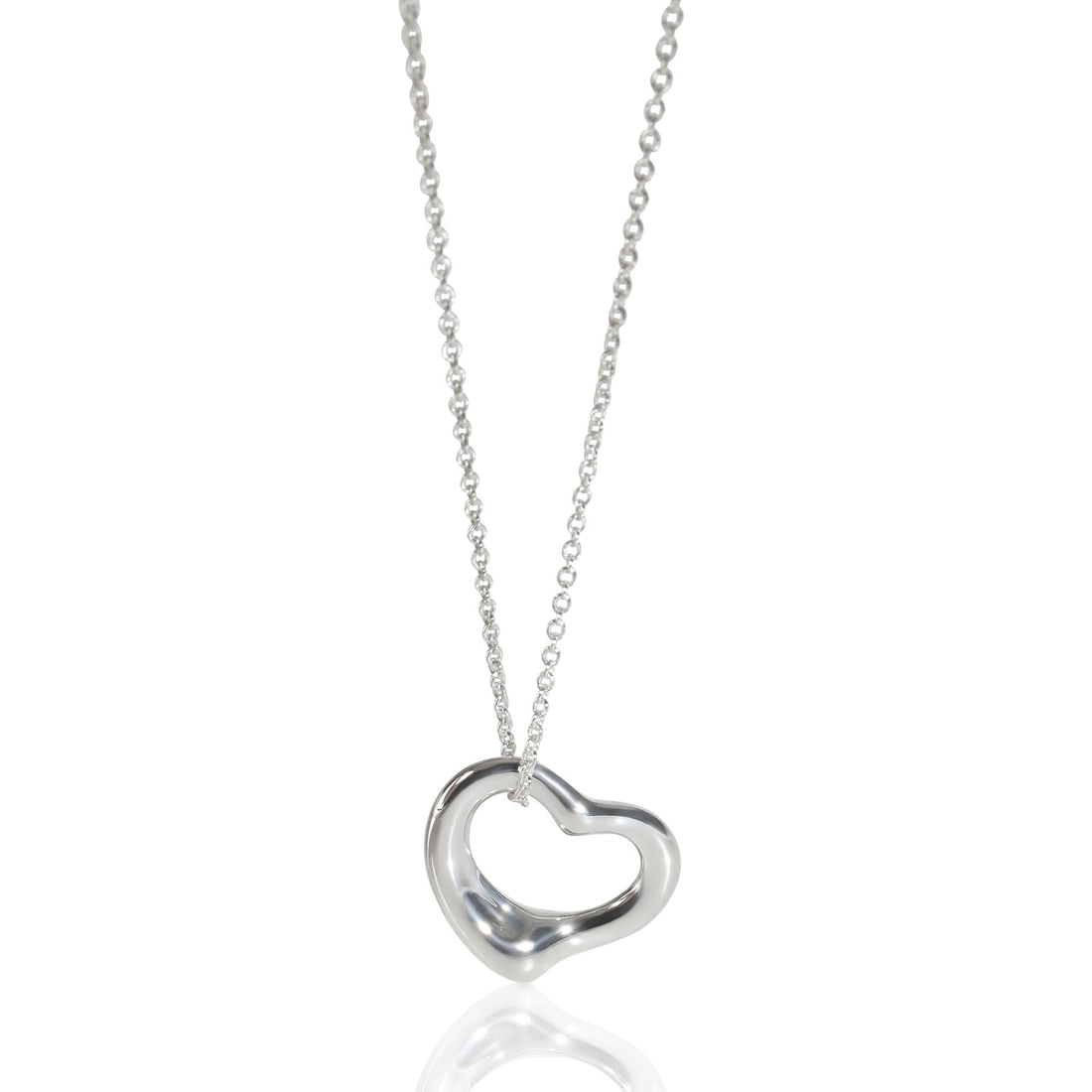 Open Heart Pendant in Sterling Silver by Tiffany & Co.: Open Heart Pendant in Sterling Silver by Tiffany & Co. This Tiffany & Co. Open Heart pendant is crafted from 925 sterling silver and features a classic open heart design. The pendant is presented on a