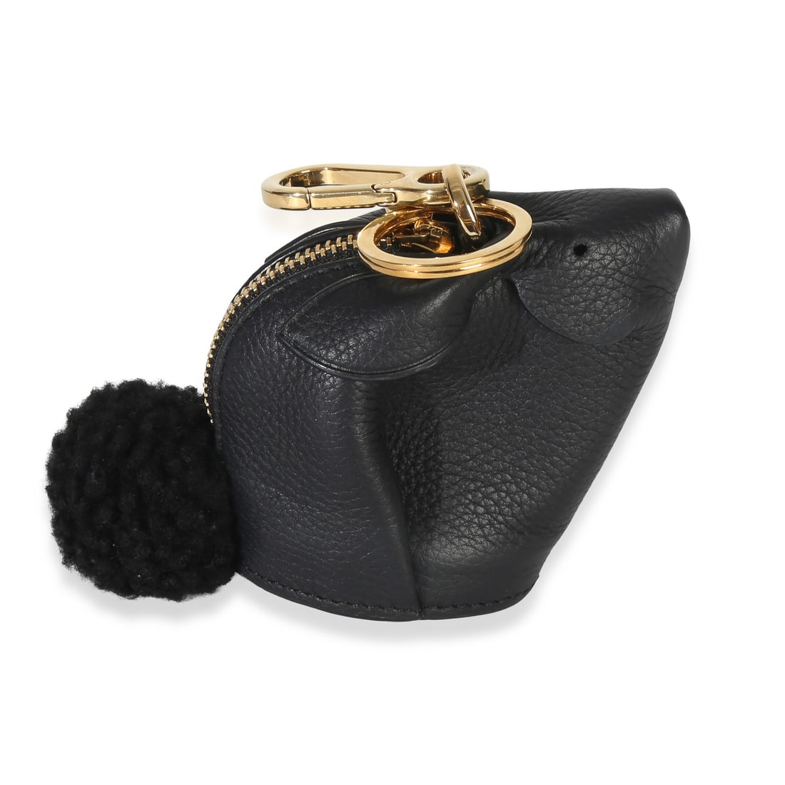 Black Shearling Bunny Leather Coin Wallet by Loewe: Black Shearling Bunny Leather Coin Wallet by Loewe This Loewe Bunny Coin Purse is crafted from black calfskin leather with shearling accents and features a zip-top closure. The compact mini size is de