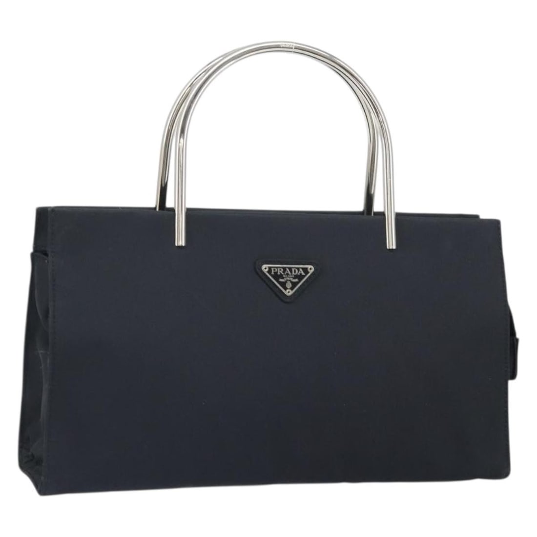 Prada Black Nylon Handbag with Silver Tone Hardware and Dust Bag: Prada Black Nylon Handbag with Silver Tone Hardware and Dust Bag This PRADA handbag features a sleek black and silver design crafted from durable nylon with silver-tone metal accents. Made in Italy, t