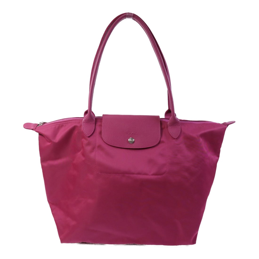 Longchamp Pink Canvas Shoulder Purse with Silver Hardware: Longchamp Pink Canvas Shoulder Purse with Silver Hardware This Longchamp shoulder bag features a pink canvas exterior and is designed for women. It offers a spacious interior, ideal for everyday use, 