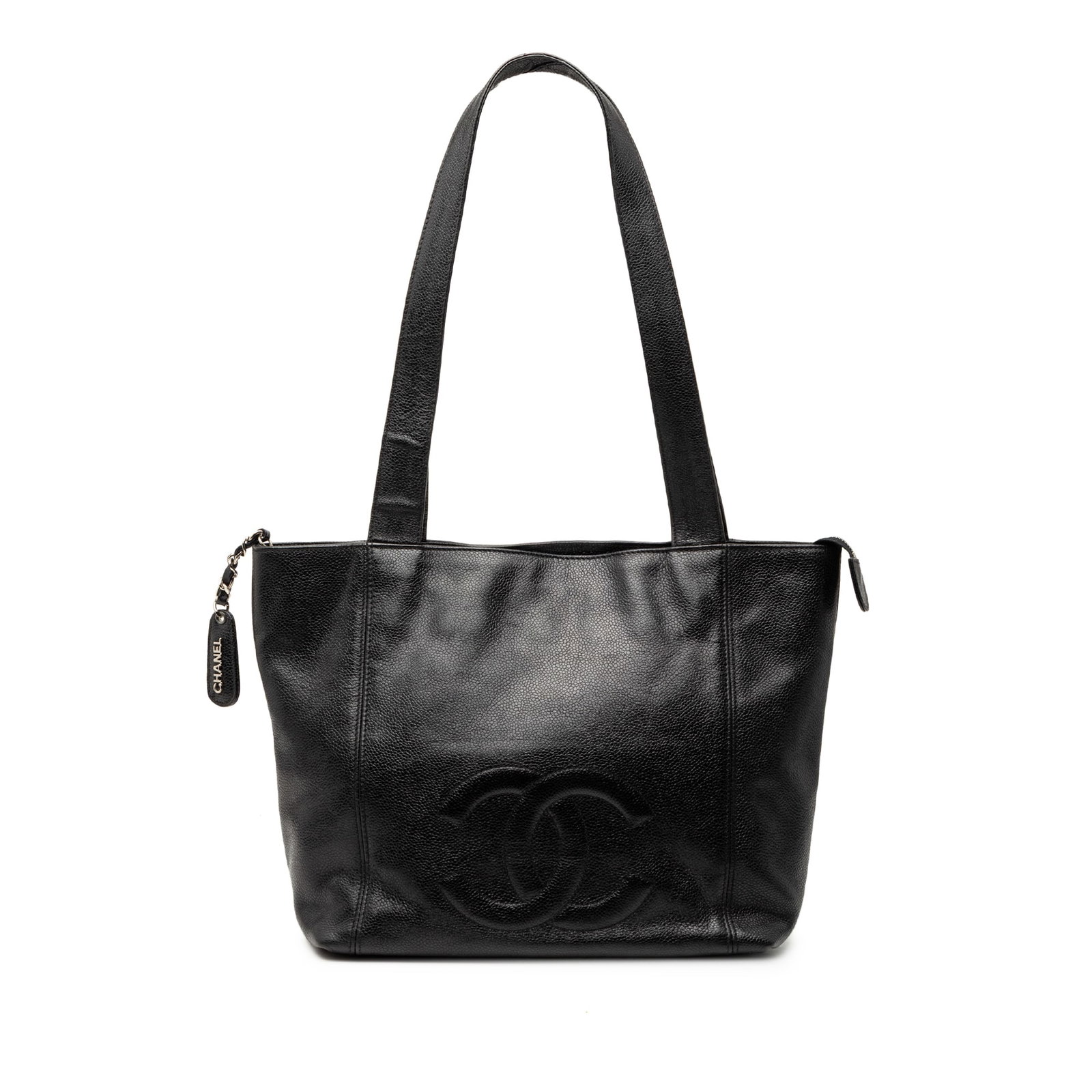 Black Leather Tote by Chanel CC Caviar Collection: Black Leather Tote by Chanel CC Caviar Collection This Chanel CC Caviar Tote is crafted from black leather and features flat leather straps, a top zip closure, and interior zip pockets. Made in Italy,