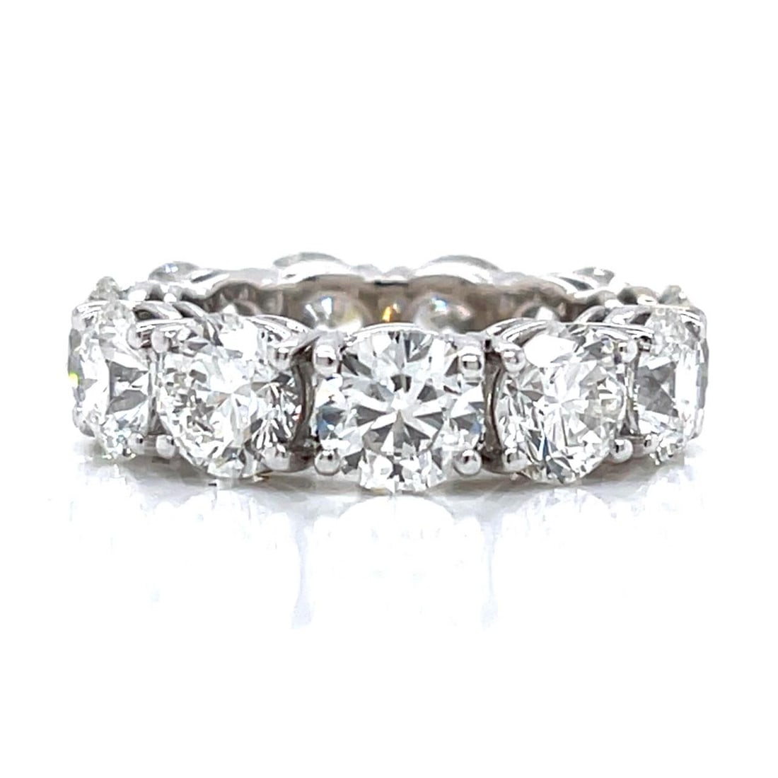 18K White Gold 11.00 Ct Diamond Eternity Band Size 6.75: 18K White Gold 11.00 Ct Diamond Eternity Band Size 6.75 This exquisite 18K White Gold Eternity Band features a stunning arrangement of 11 diamonds, collectively weighing approximately 11.00 carats. Th