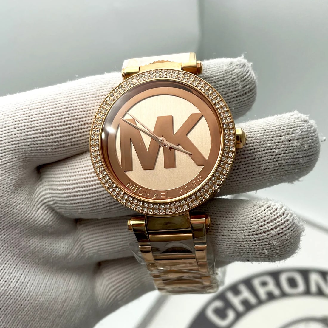 Michael Kors Parker 39mm Rose Gold Crystal Quartz Ladies Watch MK5865: Michael Kors Parker 39mm Rose Gold Crystal Quartz Ladies Watch MK5865 Elevate your style with the Michael Kors Parker 39mm Gold Tone Steel Crystal Quartz Ladies Watch. This exquisite wristwatch is des