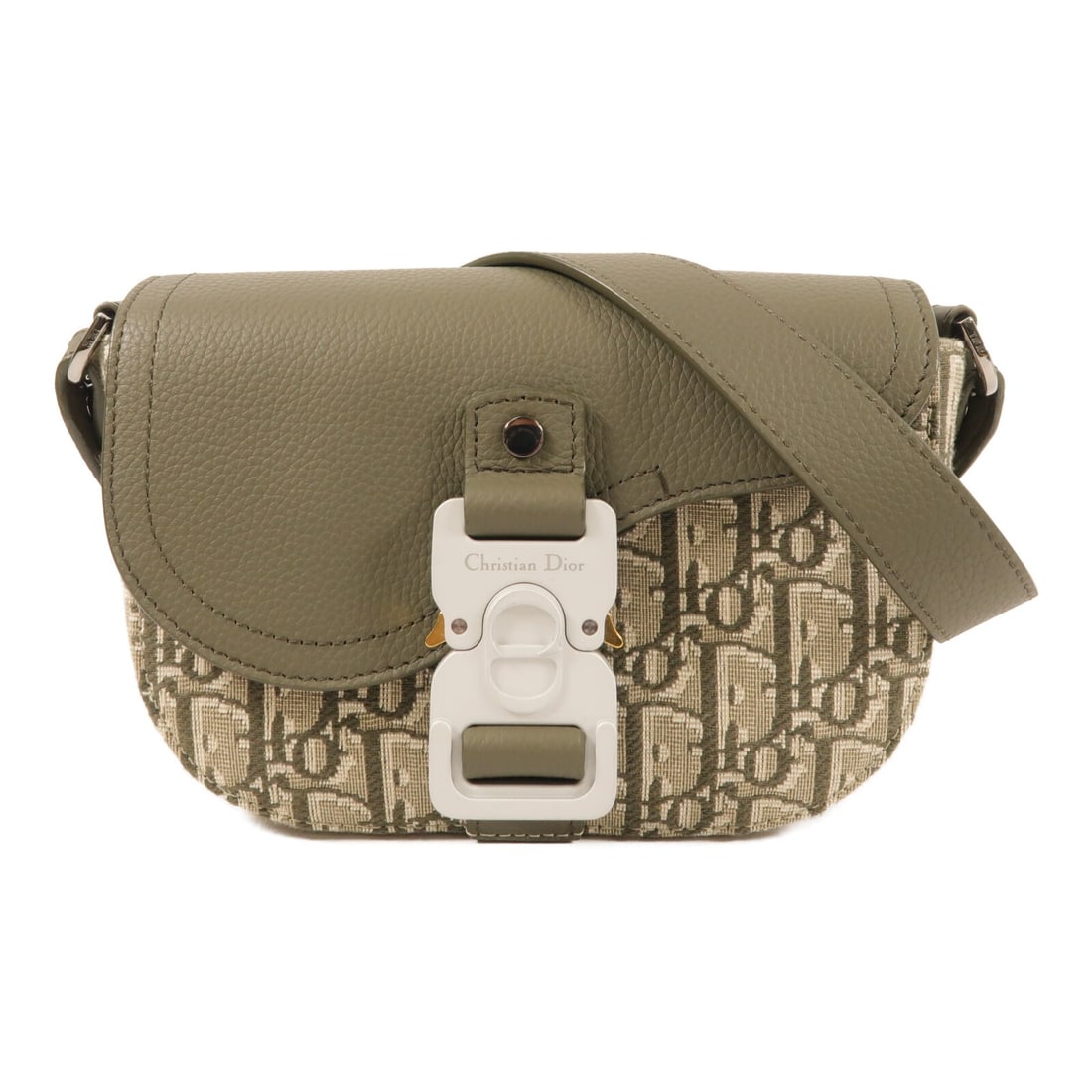 Dior Mini Saddle Canvas and Leather Green Unisex Shoulder Bag: Dior Mini Saddle Canvas and Leather Green Unisex Shoulder Bag This Christian Dior Mini Saddle Messenger Shoulder Bag features a stylish green canvas exterior with calfskin leather accents. Designed fo