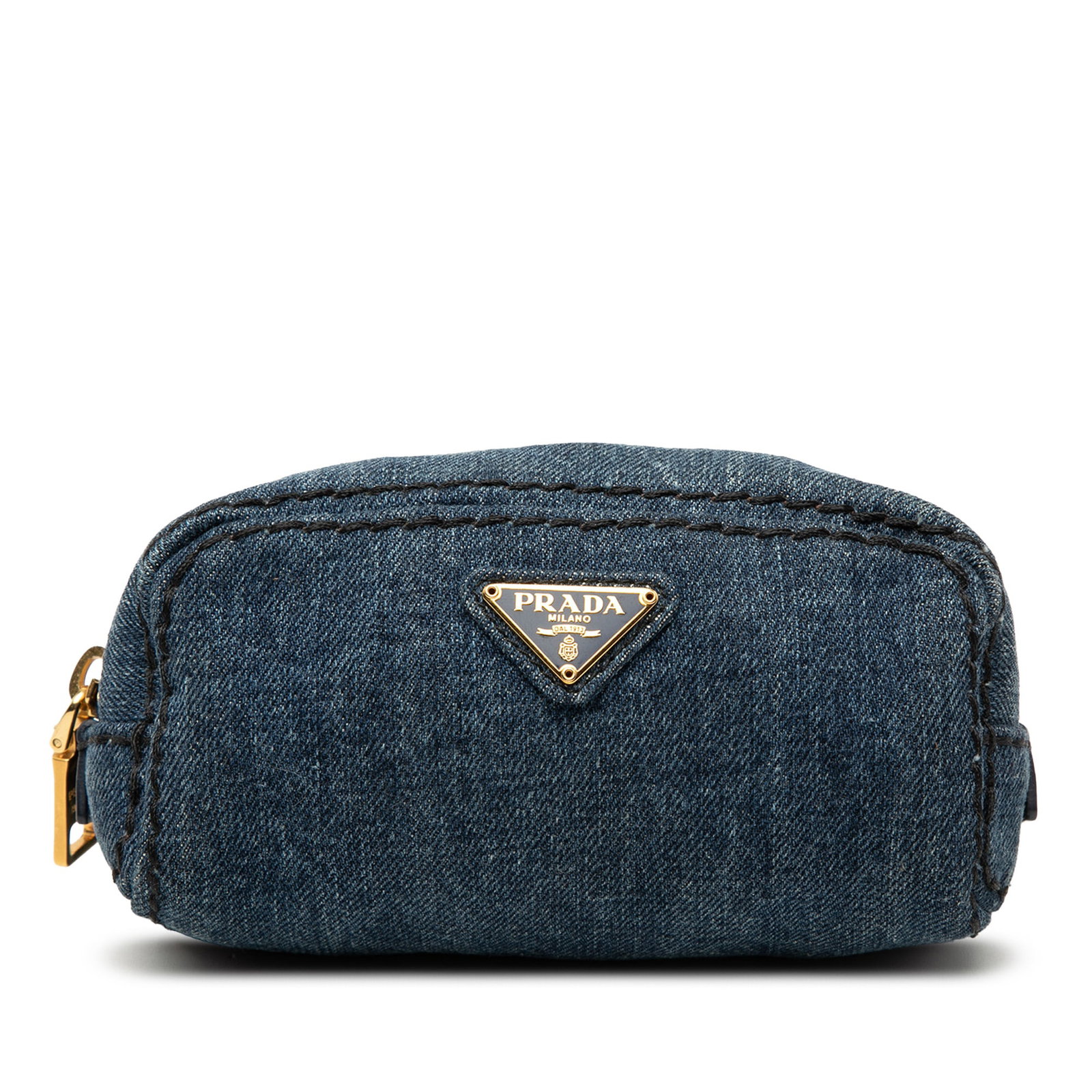 Blue Fabric Makeup Bag by Prada Denim Collection: Blue Fabric Makeup Bag by Prada Denim Collection This Prada cosmetic pouch features a blue denim body with a top zip closure. The pouch shows signs of wear, including stains on the exterior back, side