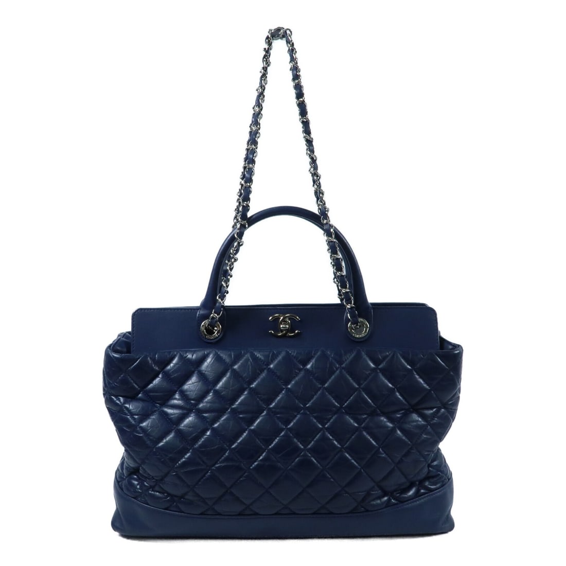 Chanel Navy Calfskin Leather Two Way Chain Shoulder Bag with Silver Hardware: Chanel Navy Calfskin Leather Two Way Chain Shoulder Bag with Silver Hardware This CHANEL 2-way chain shoulder bag is crafted from navy calfskin leather and features silver-tone hardware. Designed for 
