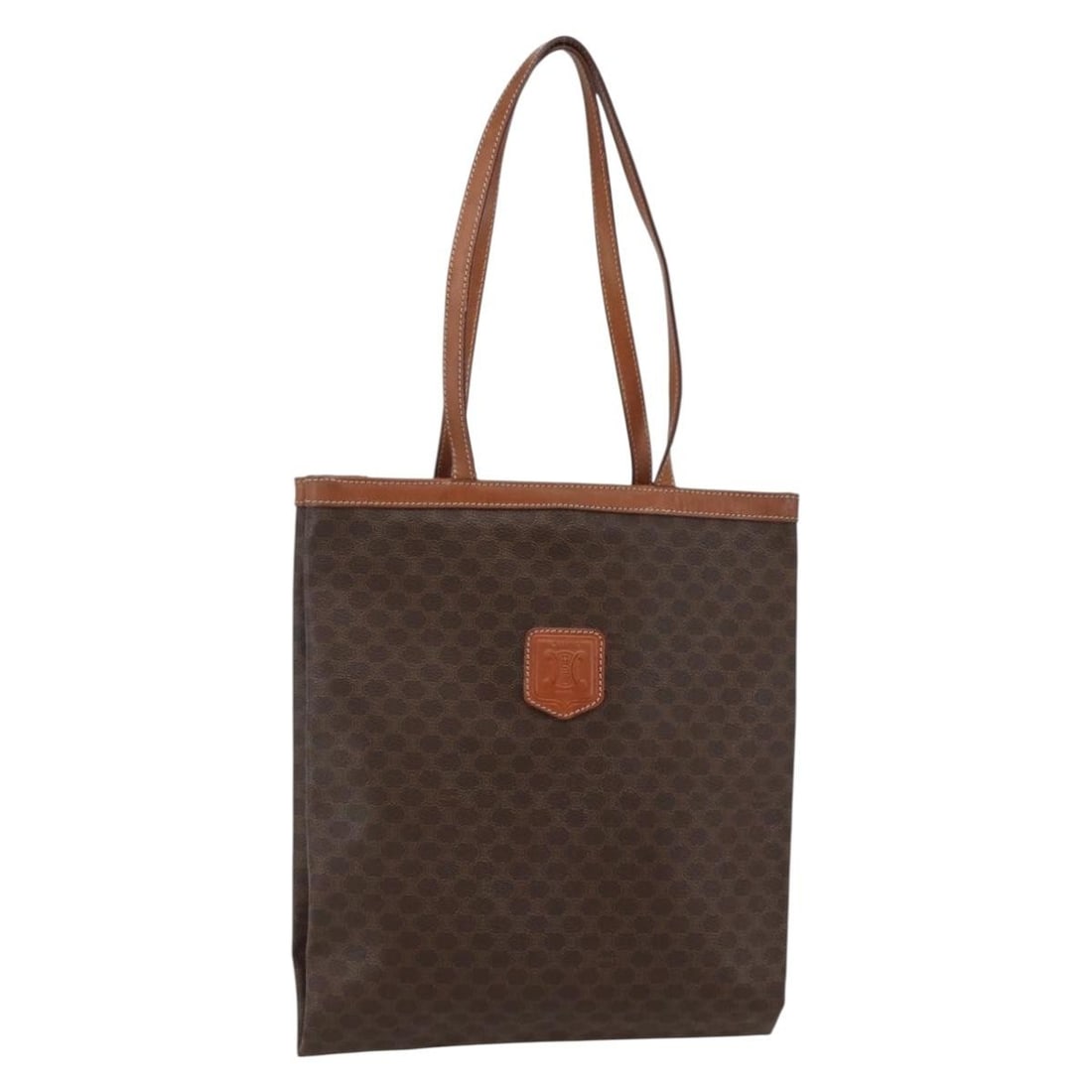 Vintage Celine Brown Canvas Tote Bag 27x32x27 cm: Vintage Celine Brown Canvas Tote Bag 27x32x27 cm This vintage Celine Macadam tote bag for women is crafted from brown canvas and features a spacious design. The bag shows signs of wear including some 
