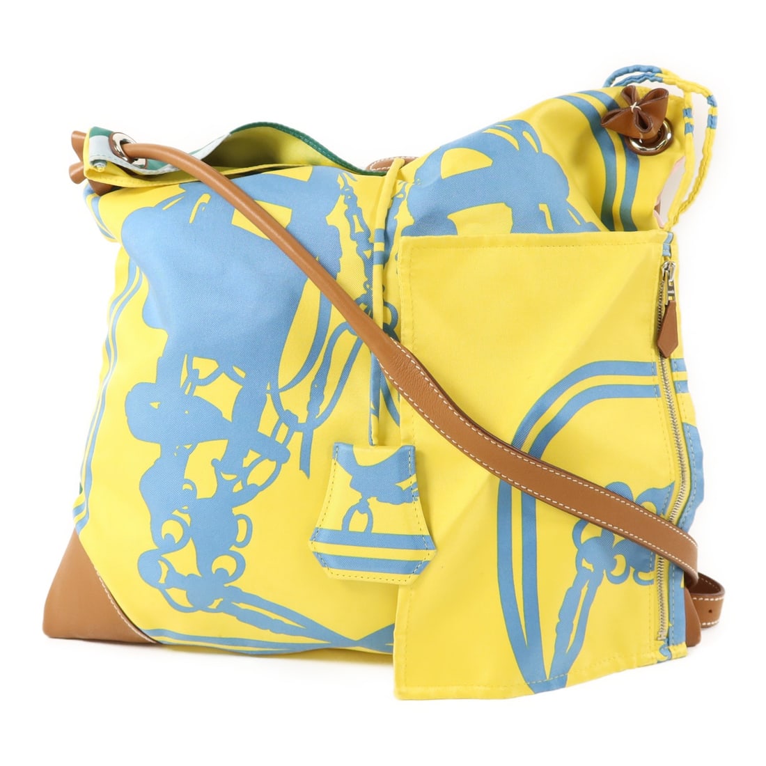Silk City Shoulder Bag in Yellow and Green by Hermes with Palladium Hardware: Silk City Shoulder Bag in Yellow and Green by Hermes with Palladium Hardware This Hermes City shoulder bag is crafted from silk in a vibrant yellow color with green accents. Designed for women, it off