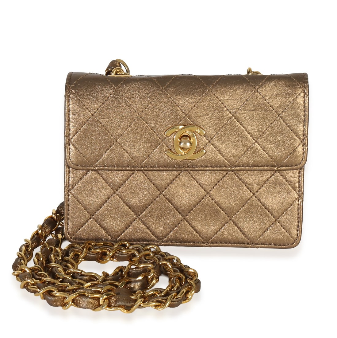 Extra Mini Square Flap Gold Quilted Lambskin Crossbody by Chanel: Extra Mini Square Flap Gold Quilted Lambskin Crossbody by Chanel This Chanel Vintage Extra Mini Square Flap Bag features a gold metallic quilted lambskin leather exterior and gold-tone hardware. The b