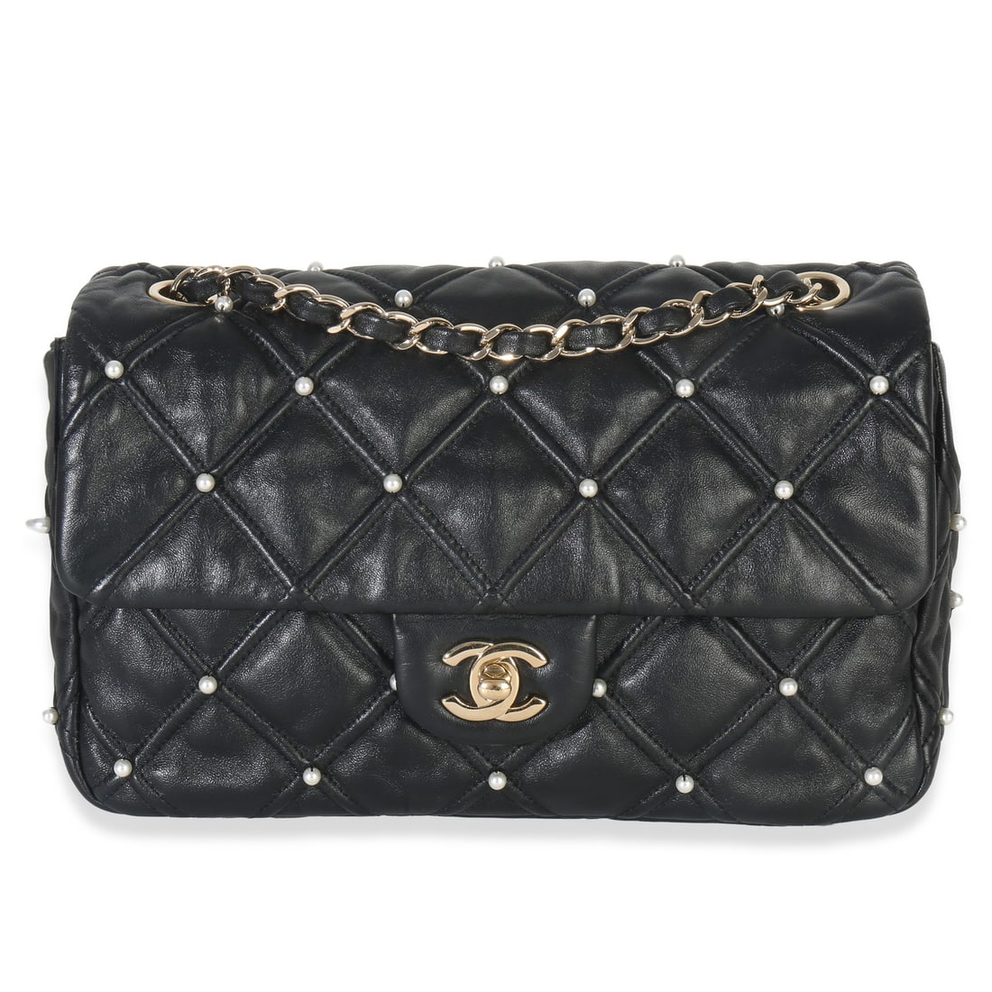 Medium CC Flap Shoulder Bag with Black Pearl Studs by Chanel: Medium CC Flap Shoulder Bag with Black Pearl Studs by Chanel This Chanel Medium CC Flap Bag features black lambskin leather adorned with pearl studs and gold-tone hardware. The bag has a turnlock clos