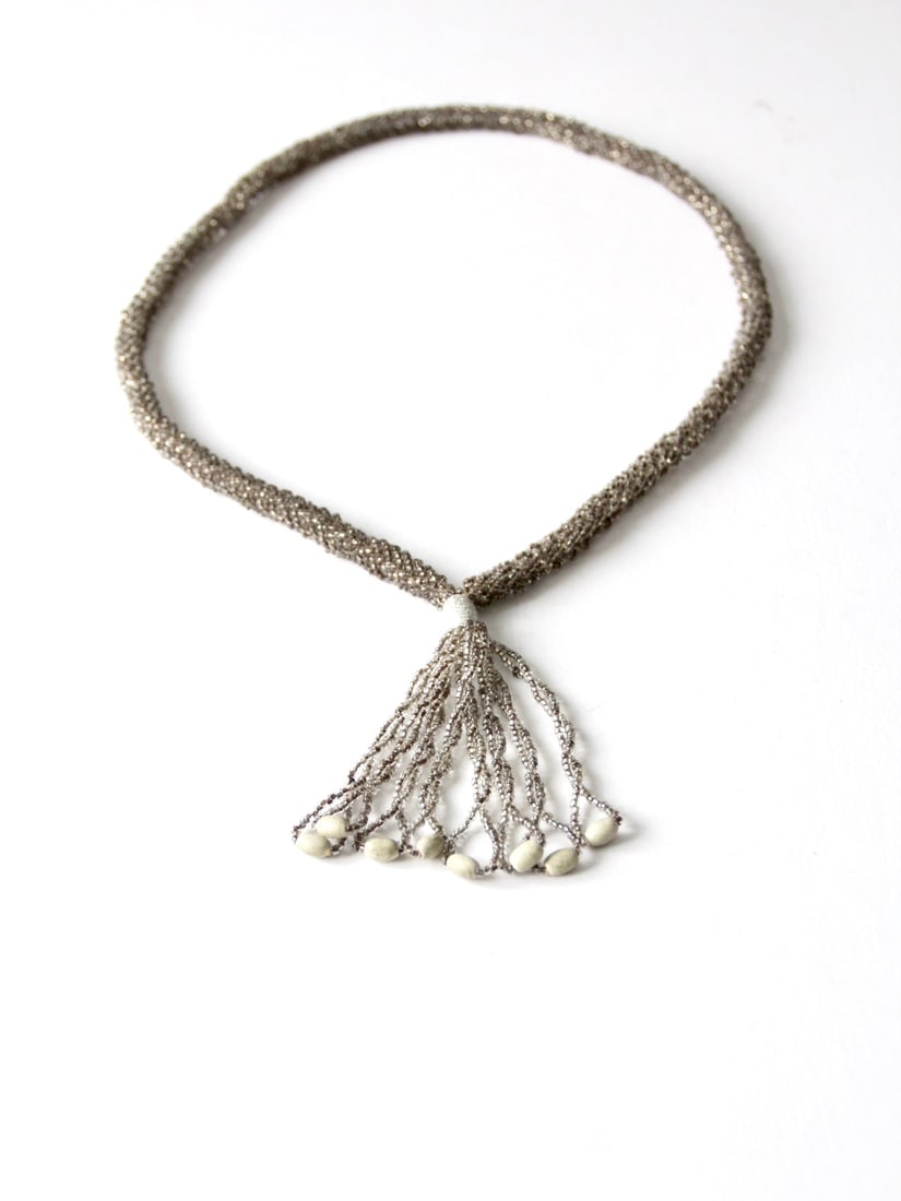 Art Deco Vintage Beaded Tassel Necklace 33 inch Silver Glass Seed Beads: Art Deco Vintage Beaded Tassel Necklace 33 inch Silver Glass Seed Beads This vintage beaded tassel necklace showcases a stunning design featuring silver glass seed beads that form a flapper-style tubu