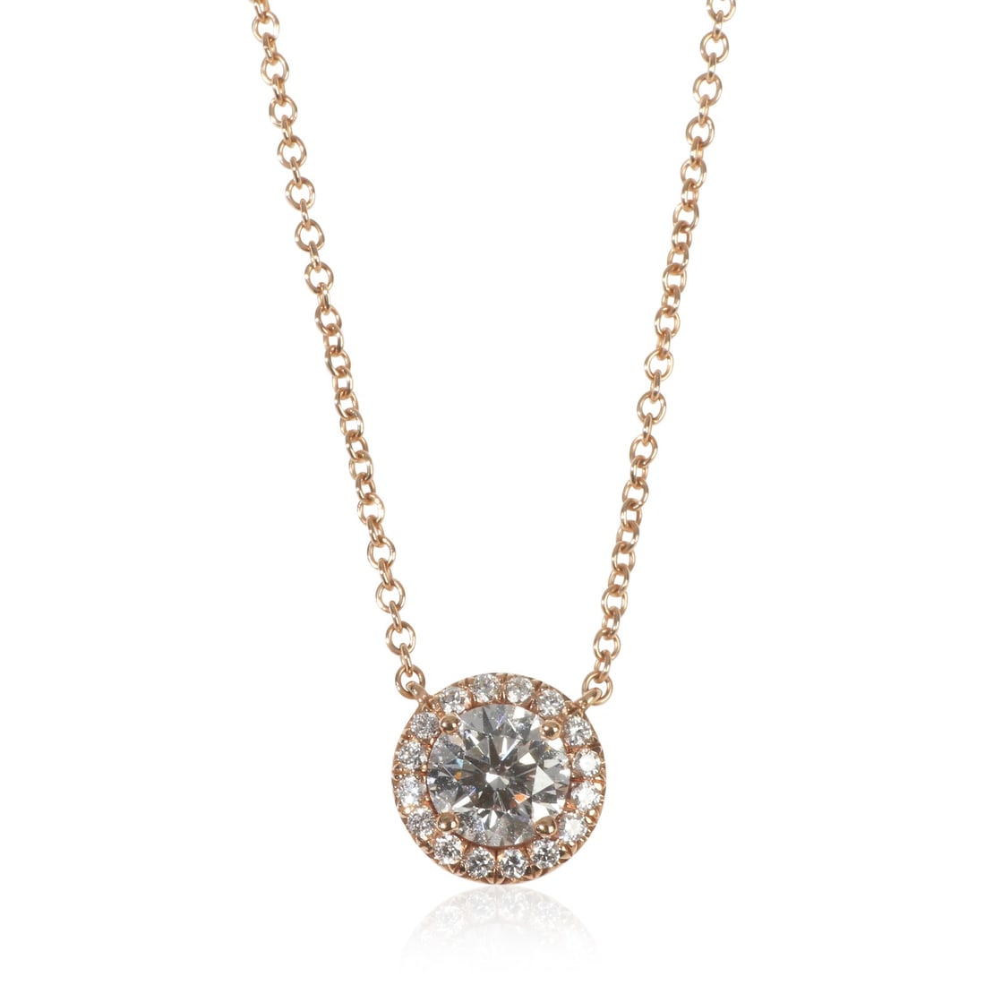 Soleste Round Diamond Pendant in 18k Rose Gold with Tiffany Certificate: Soleste Round Diamond Pendant in 18k Rose Gold with Tiffany Certificate This Tiffany & Co. Soleste pendant features a round brilliant-cut diamond as the centerpiece, complemented by additional diamond