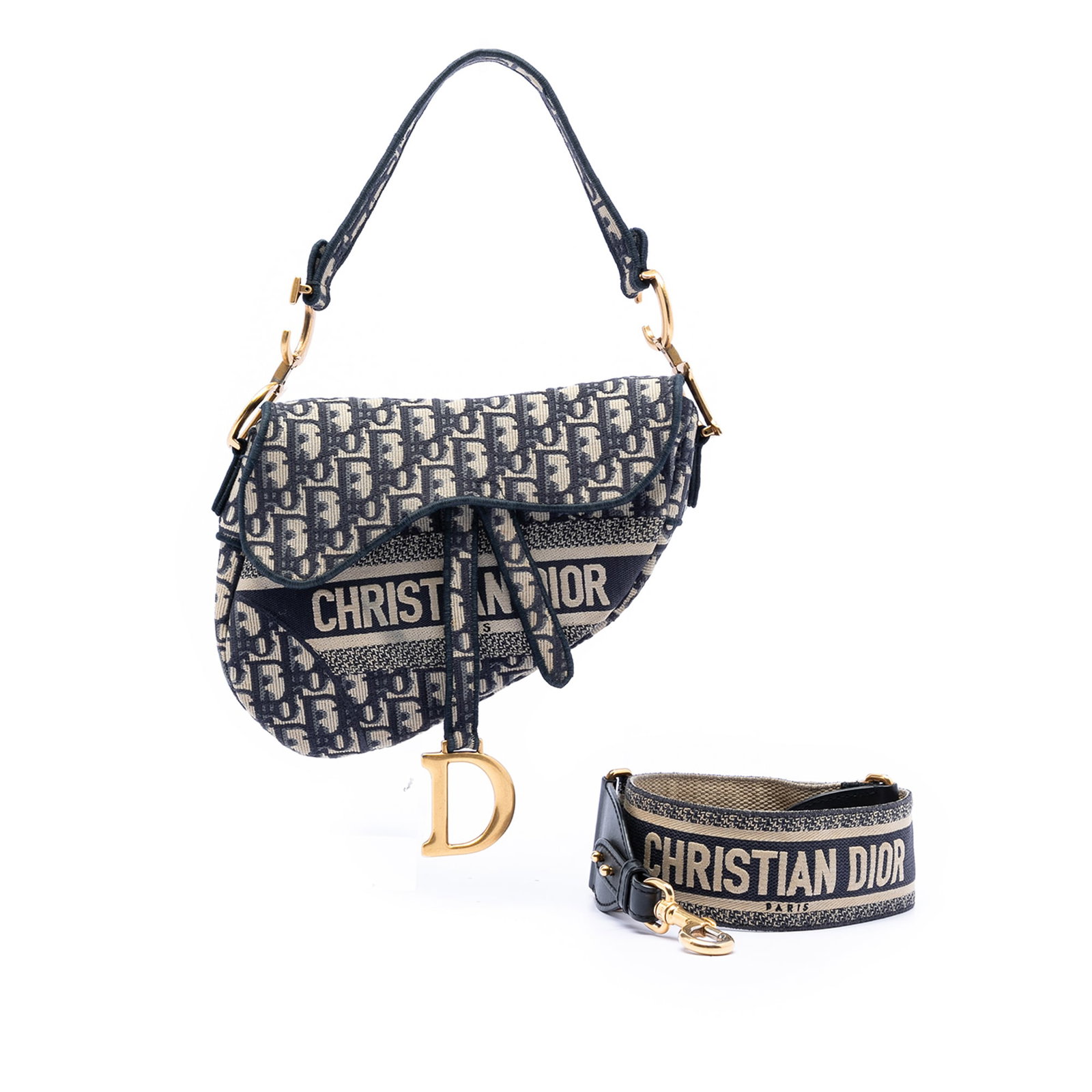 Dior Saddle Bag Blue Oblique Canvas with Embroidered Detailing and Leather Trim: Dior Saddle Bag Blue Oblique Canvas with Embroidered Detailing and Leather Trim This Dior Oblique Saddle Bag features an embroidered canvas body with leather trim, a flat strap, a front flap with magn