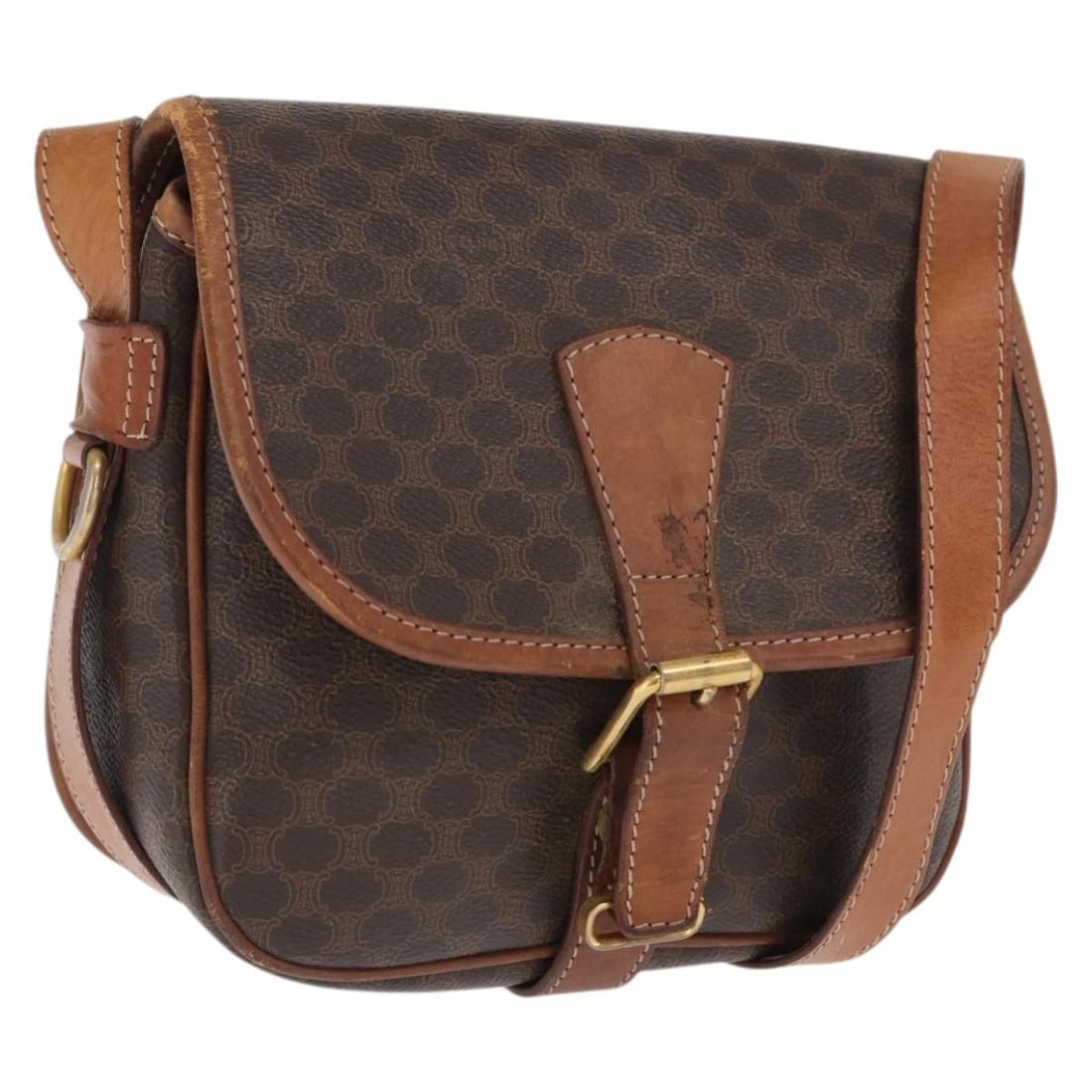 Brown Gold PVC Leather Macadam Canvas Shoulder Bag by CELINE: Brown Gold PVC Leather Macadam Canvas Shoulder Bag by CELINE This CELINE shoulder bag features a brown and gold Macadam canvas exterior combined with PVC leather. Crafted in Italy, it measures approxi