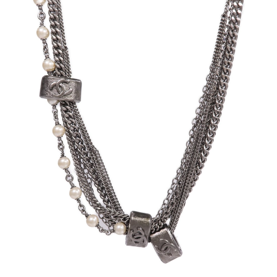 Chanel Silver Tone CC Pendant Necklace for Women: Chanel Silver Tone CC Pendant Necklace for Women This CHANEL necklace features the iconic CC logo in a silver-tone metal. Designed for women, it showcases a minimalist style without any gemstones. Mad
