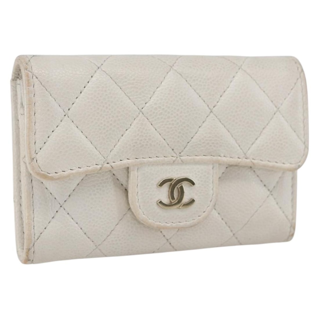 Chanel White Grained Calfskin Coin Purse with Gold CC Logo: Chanel White Grained Calfskin Coin Purse with Gold CC Logo This CHANEL coin purse is crafted from grained calfskin leather in white with gold-tone accents and signature CC logo. The purse is made in F