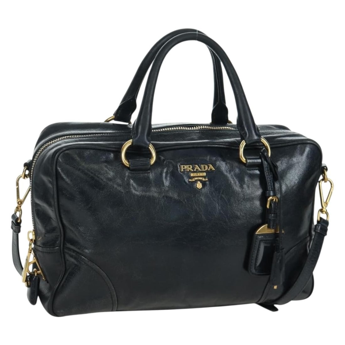 Prada Navy Leather 2way Handbag with Gold Accents and Shoulder Strap: Prada Navy Leather 2way Handbag with Gold Accents and Shoulder Strap This Prada 2-way handbag is crafted from navy leather with gold-tone accents. Designed for women, it features both a handle and a d