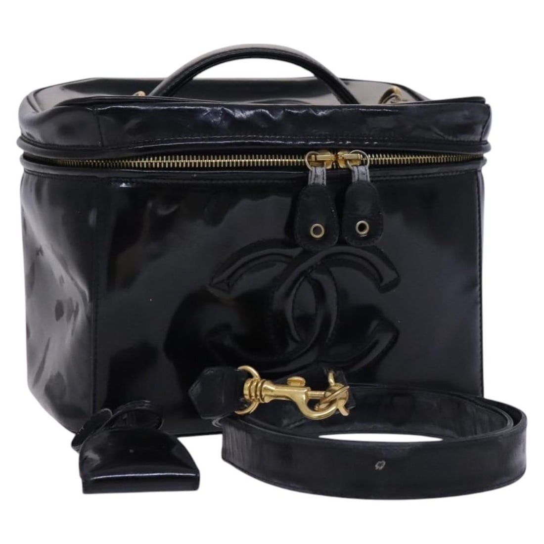 CHANEL Black Patent Leather Vanity Bag with Gold CC Padlock and Shoulder Strap: CHANEL Black Patent Leather Vanity Bag with Gold CC Padlock and Shoulder Strap This CHANEL Vanity Pouch is crafted from black and gold patent leather and offers versatile 2-way wear. Designed for wome
