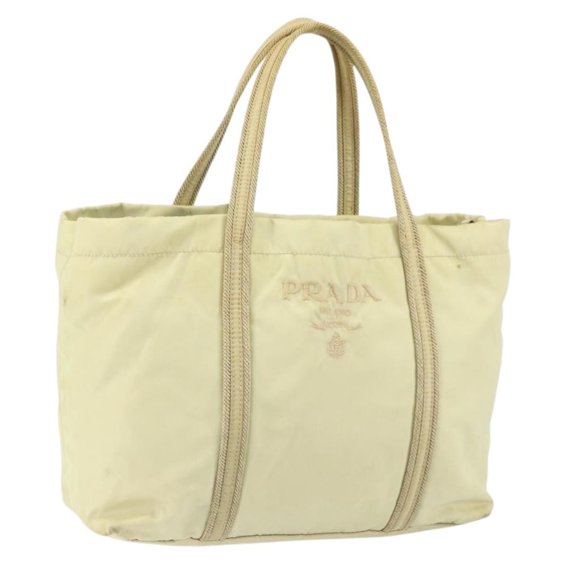 PRADA Ivory Silver Nylon Hand Bag with Authenticity 148423: PRADA Ivory Silver Nylon Hand Bag with Authenticity 148423 This PRADA hand bag is crafted from durable nylon in a stylish ivory and silver color combination. With its elegant design, it is perfect for