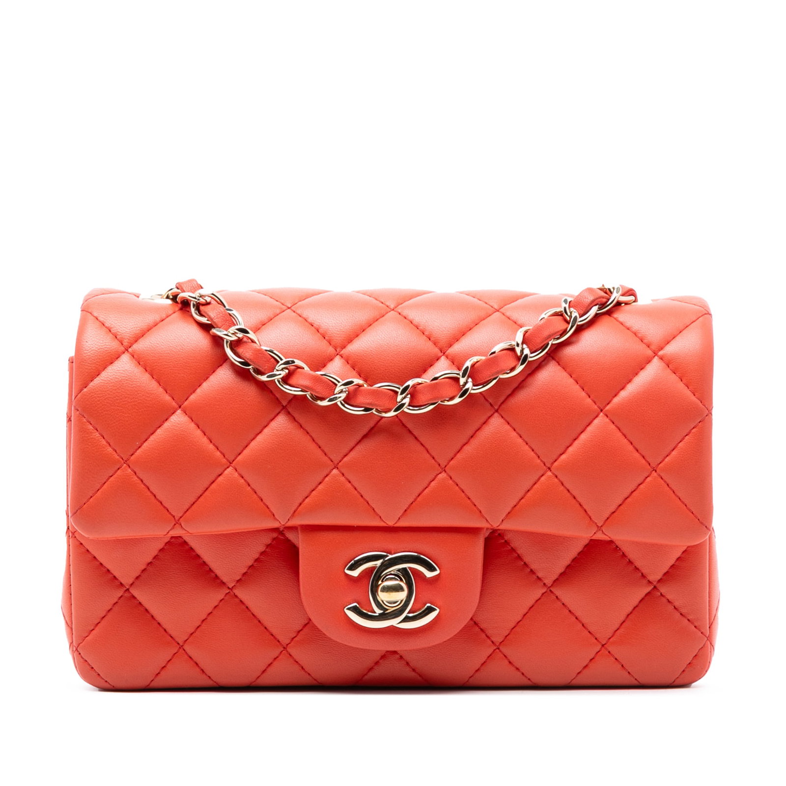 Chanel Mini Rectangular Classic Orange Quilted Lambskin Flap Shoulder Bag: Chanel Mini Rectangular Classic Orange Quilted Lambskin Flap Shoulder Bag This Chanel Mini Rectangular Classic Single Flap bag showcases an orange quilted lambskin leather body with a sleek front flap