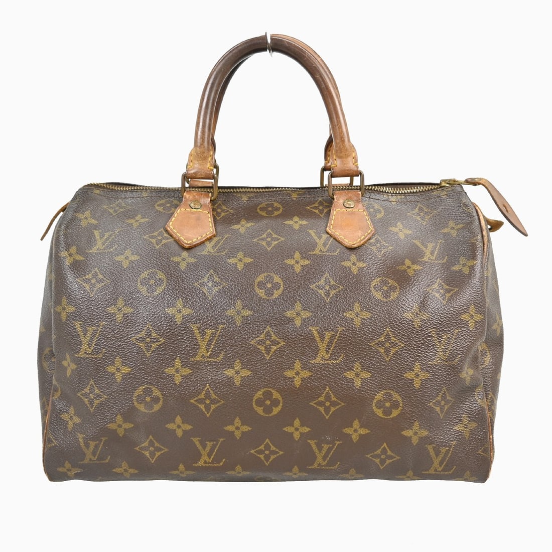 Louis Vuitton Speedy 30 Monogram Canvas Satchel with Double Leather Handles: Louis Vuitton Speedy 30 Monogram Canvas Satchel with Double Leather Handles This Louis Vuitton Speedy 30 is a medium-sized satchel featuring the iconic monogram canvas exterior and double beige leathe
