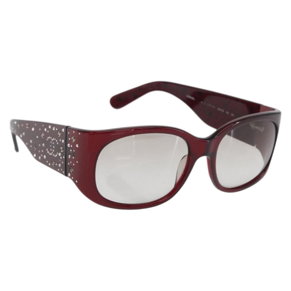 Bordeaux Plastic Sunglasses by CHANEL with Case Model ka2080: Bordeaux Plastic Sunglasses by CHANEL with Case Model ka2080 These CHANEL sunglasses feature a bordeaux-colored plastic frame with signature CC detailing. They are accompanied by a sunglass case. Plea