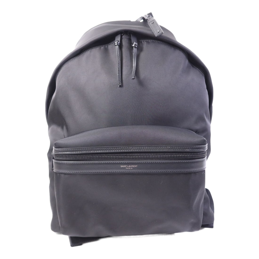Black Nylon Rucksack Backpack by Yves Saint Laurent YSL: Black Nylon Rucksack Backpack by Yves Saint Laurent YSL This Yves Saint Laurent rucksack backpack features a black nylon exterior, combining stylish design with durability. Made in Italy, this unisex 