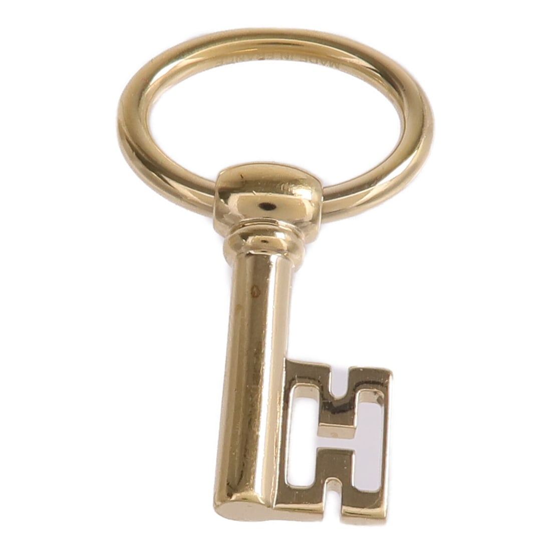 Gold Tone Scarf Ring by Hermes for Women: Gold Tone Scarf Ring by Hermes for Women This Hermes scarf ring features a gold-colored metal design, crafted in France and intended for women. The piece does not include any stones and is suitable fo