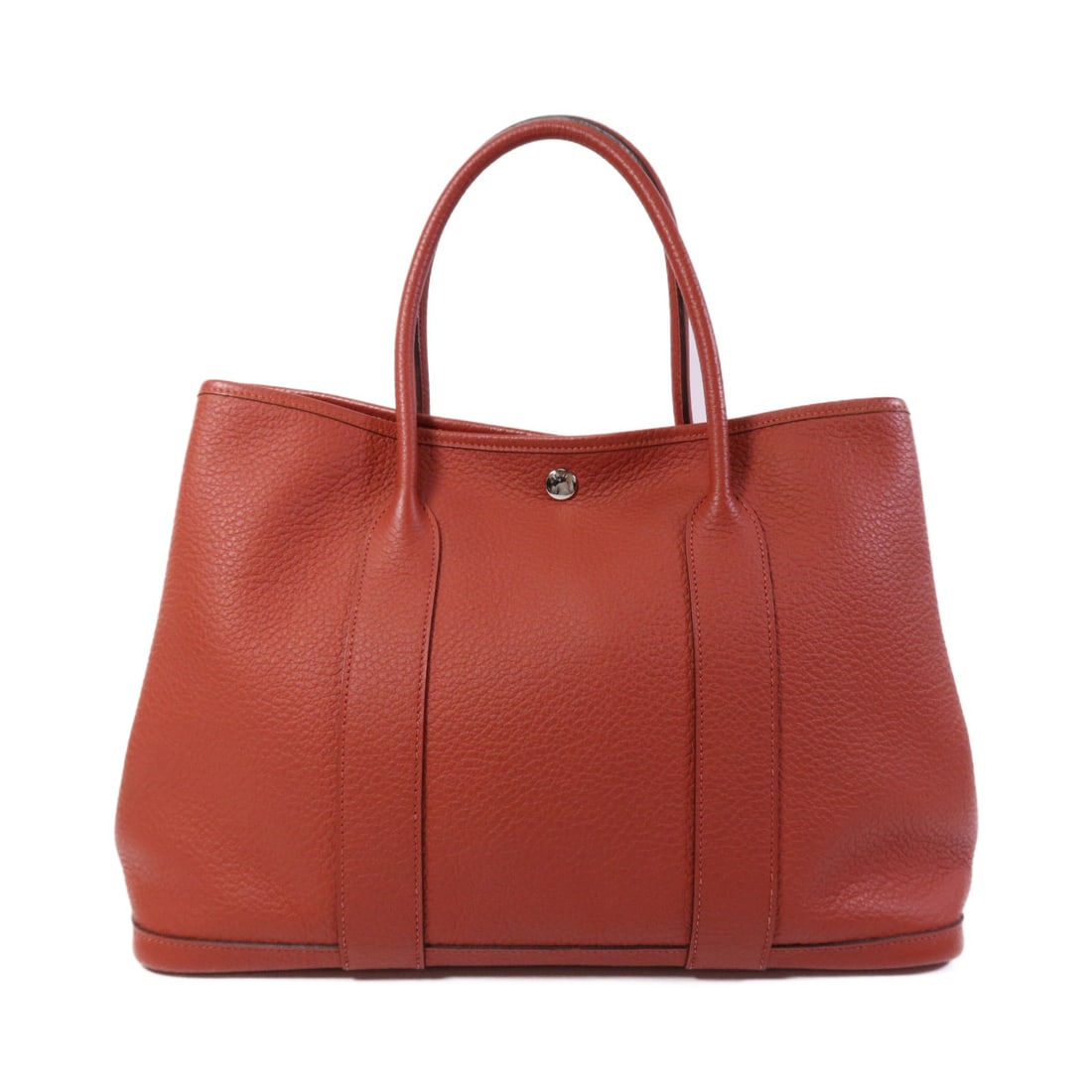 Hermes Garden Party PM Red Calfskin Tote with Palladium Hardware: Hermes Garden Party PM Red Calfskin Tote with Palladium Hardware This Hermes Garden Party PM handbag features a Negonda leather exterior in a rich red color. Crafted from calfskin, it is designed for 