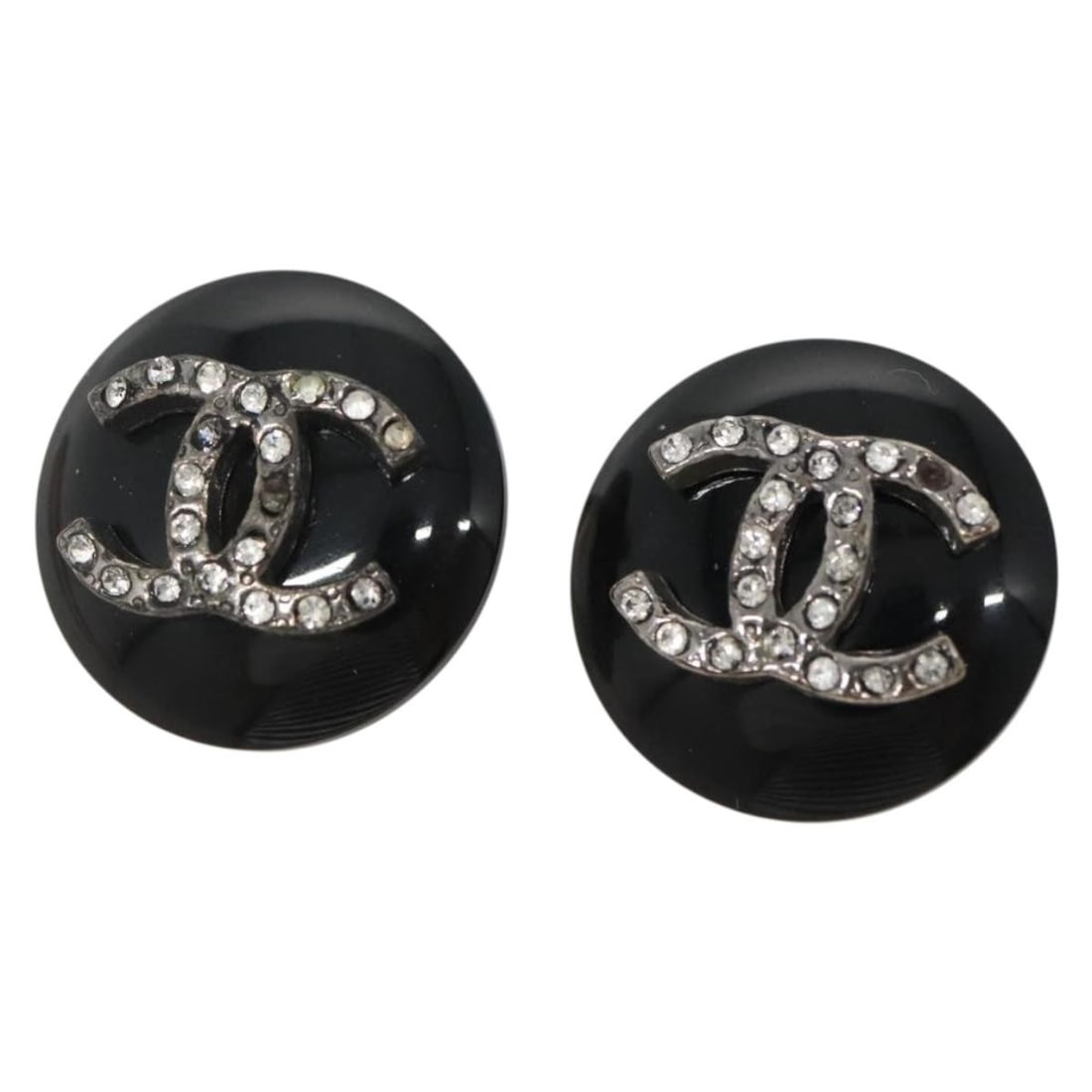 CHANEL Black Plastic CC Earrings Authenticated France: CHANEL Black Plastic CC Earrings Authenticated France Elevate your accessory game with these authentic CHANEL earrings, crafted in elegant black plastic. These stylish pieces are characterized by the 