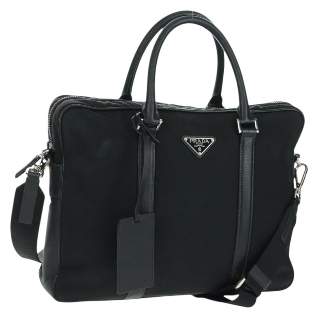 Prada Black Nylon Convertible Handbag with Silver Hardware and Shoulder Strap: Prada Black Nylon Convertible Handbag with Silver Hardware and Shoulder Strap This PRADA 2-way hand bag is crafted from black nylon with silver-tone accents. It features both a top handle and an adjus